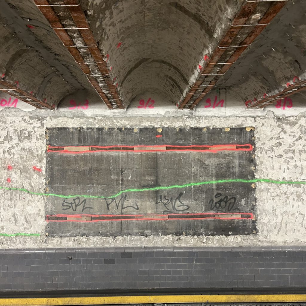 Picture of a painted subway advertisement board
